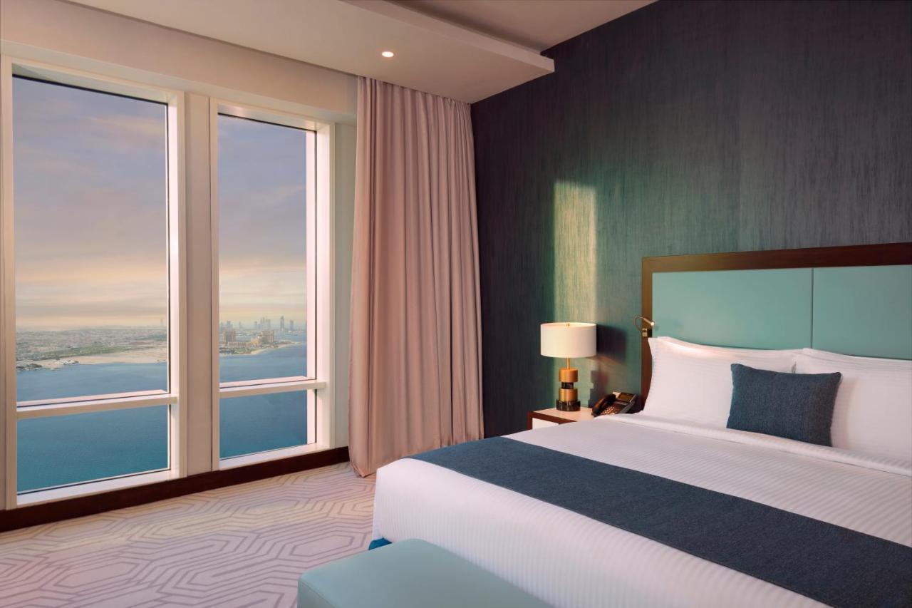 Wyndham Grand Doha West Bay Beach מראה חיצוני תמונה A bedroom at the Address Downtown Dubai