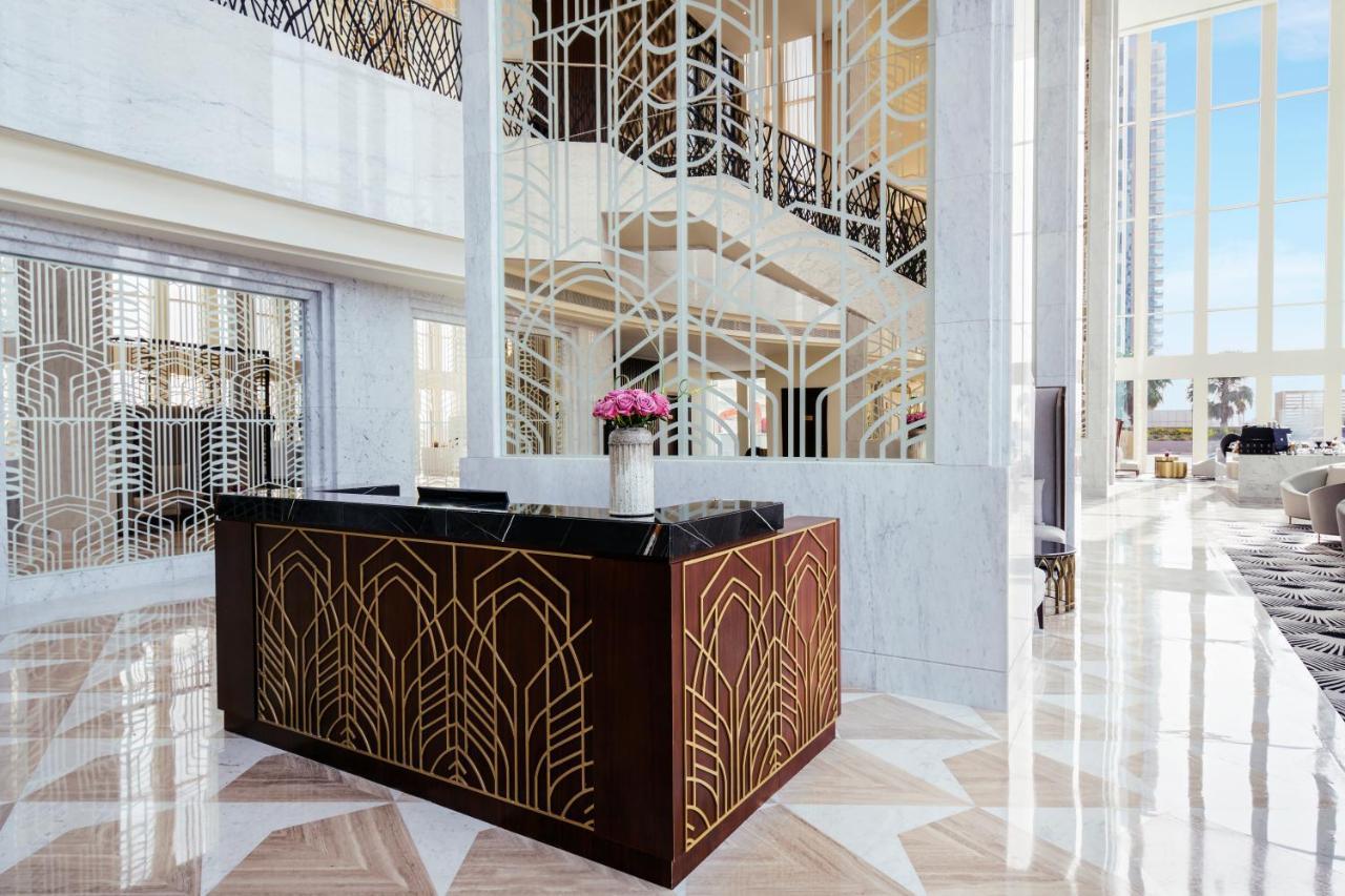 Wyndham Grand Doha West Bay Beach מראה חיצוני תמונה The lobby of the hotel